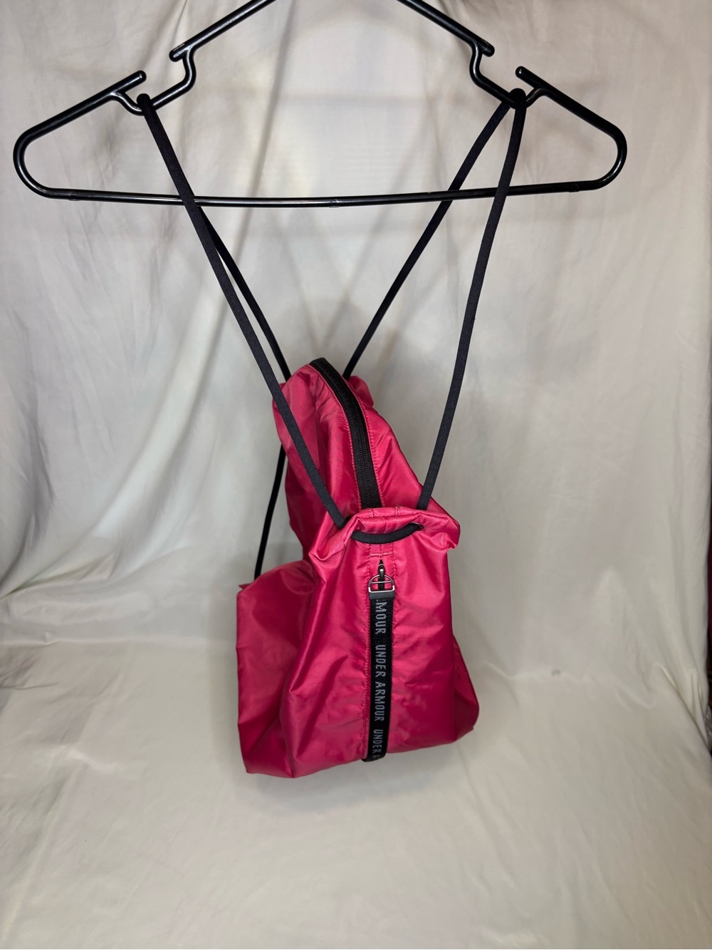 Under Armour Hot Pink Drawstring Backpack/Purse with Black Straps and F Pocket